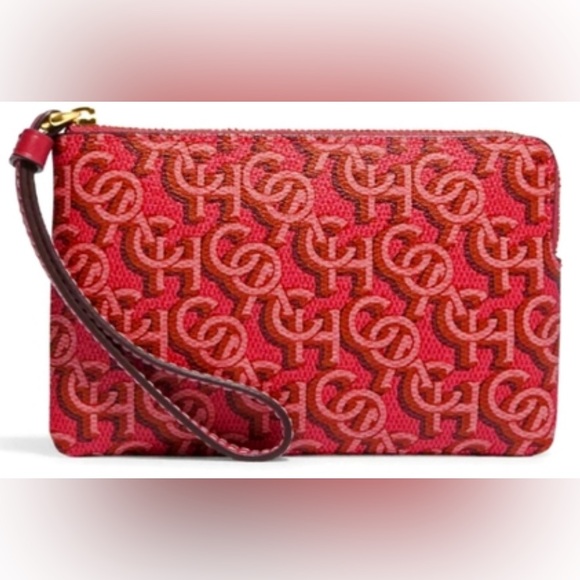Coach Handbags - Coach monogram zip wristlet-nwot